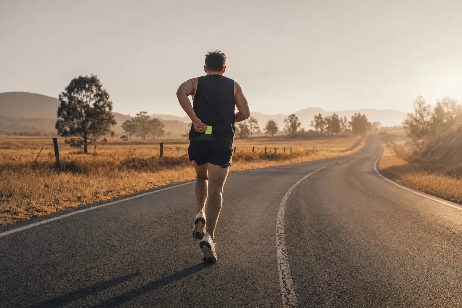 Coureur s'alimentant pendant une sortie longue.